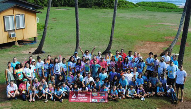 Large group of children and staff at Hawaii camp he ola ke keiki diabetes camp