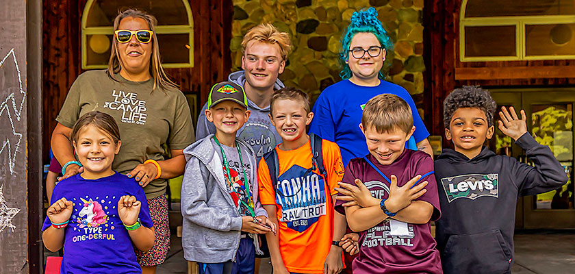 Colorfully clothed group of diabetes camp kids and counselors