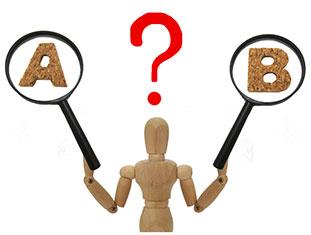Wood figurine holding two magnifying glasses with A and B in each with red question mark over figurine head