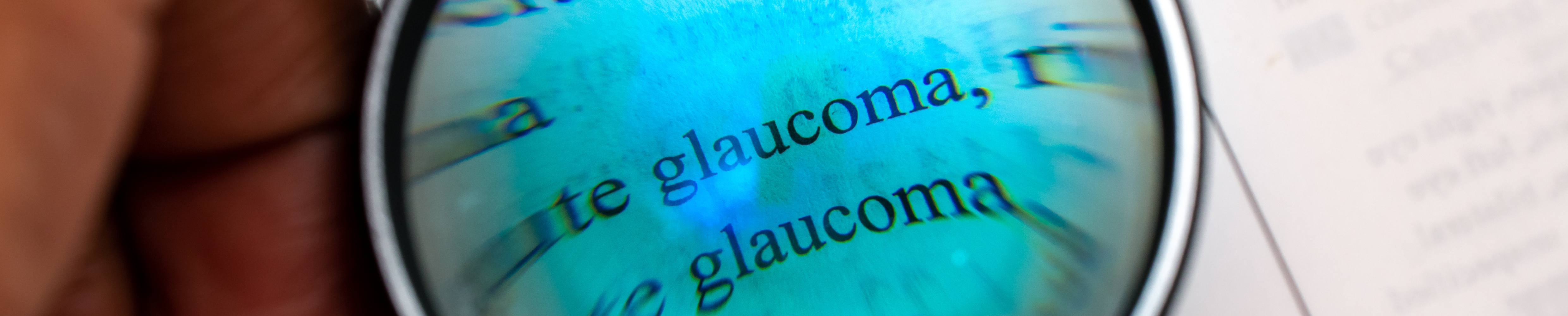 Magnifying glass showing the word glaucoma
